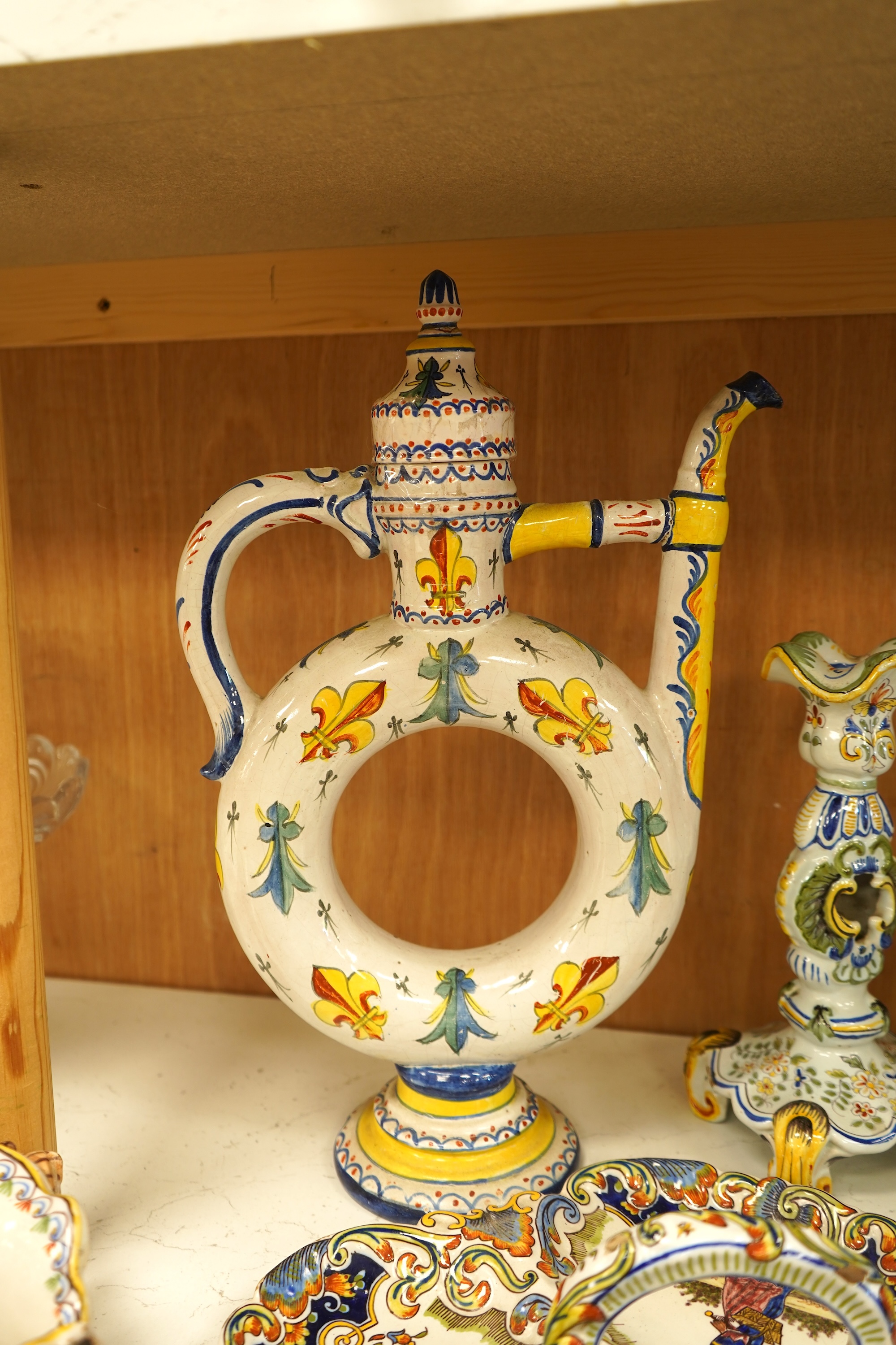 A collection of early 20th century French faience pieces To include dishes, an inkwell and a large ewer, 42cm high